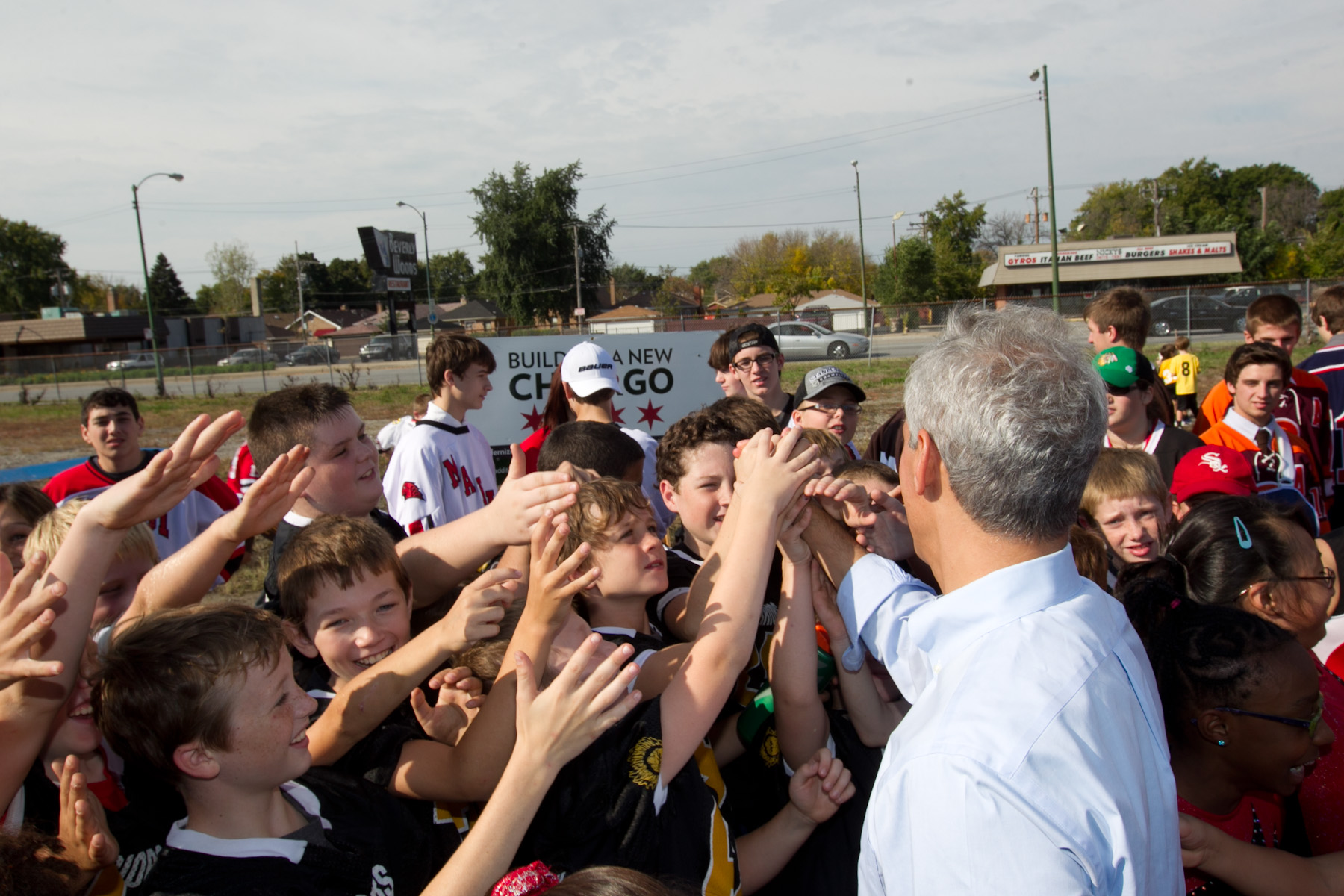 Mayor Rahm Emanuel greets youth hockey players from the Morgan Park and Beverly community